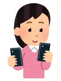 A girl is playing a phone.